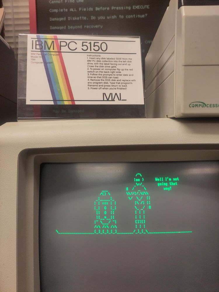 ASCII representations of C3PO and R2D2 on an IBM  PC 5150