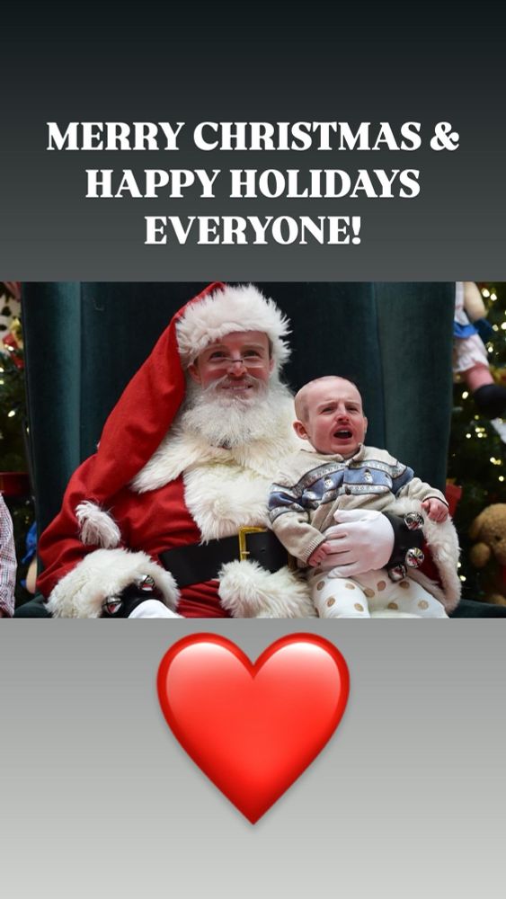 A picture of a child sat on Santa’s lap. Both faces are Danny Colligan
