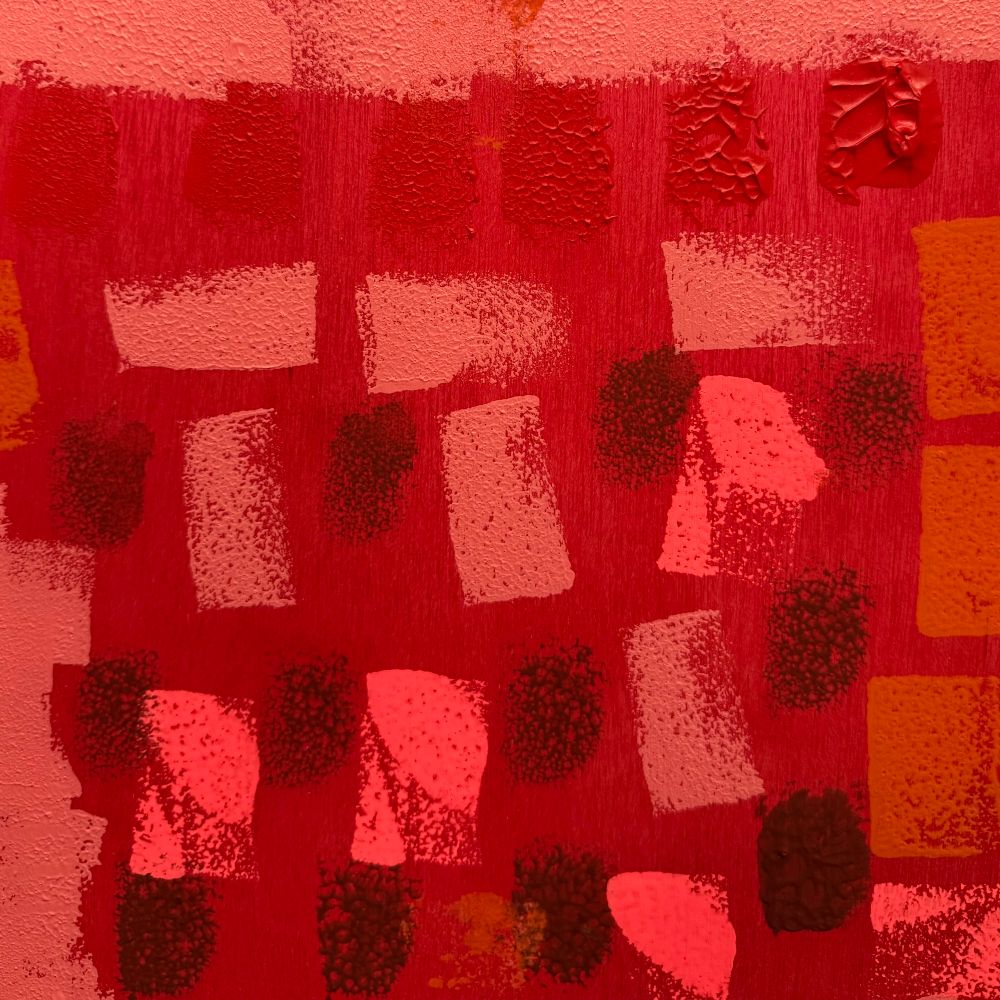 Darstellung der Farben Rot, Orange, Lila und Pink als getupftes Bild