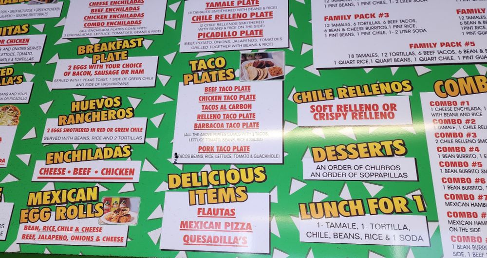 A restaurant menu showing foods under various headers, including one curiosly labeled "delicious items." 
