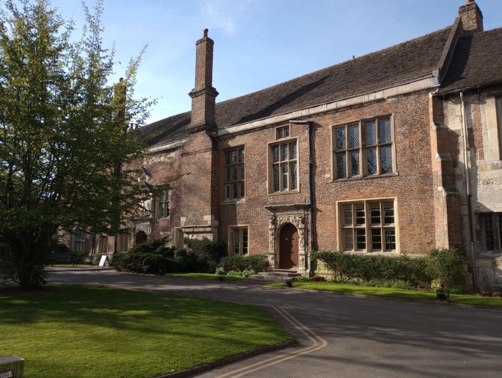 A red brick Tudor building in the sunshine at King's Manor in York