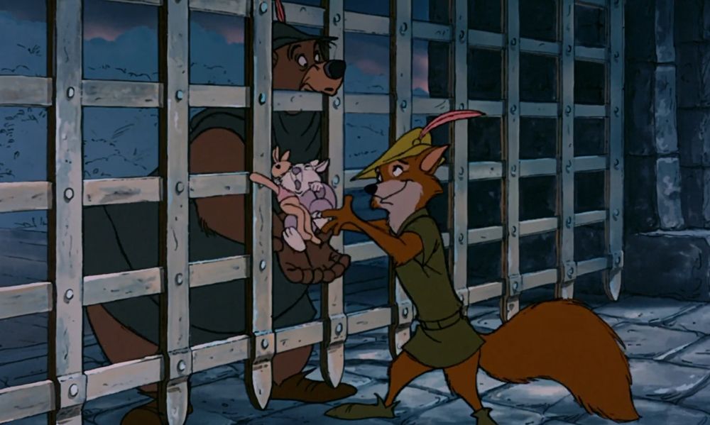Robin gently and smilingly passing a stray youngster through a portcullis to Little John after abandoning his own escape to save her while wolves with halberds charge him down