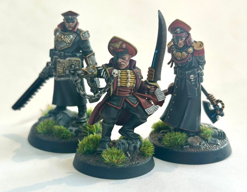 A collection of Commissars? A collective? A coalition? No, no, wait. A murder of commissars. Nailed it.