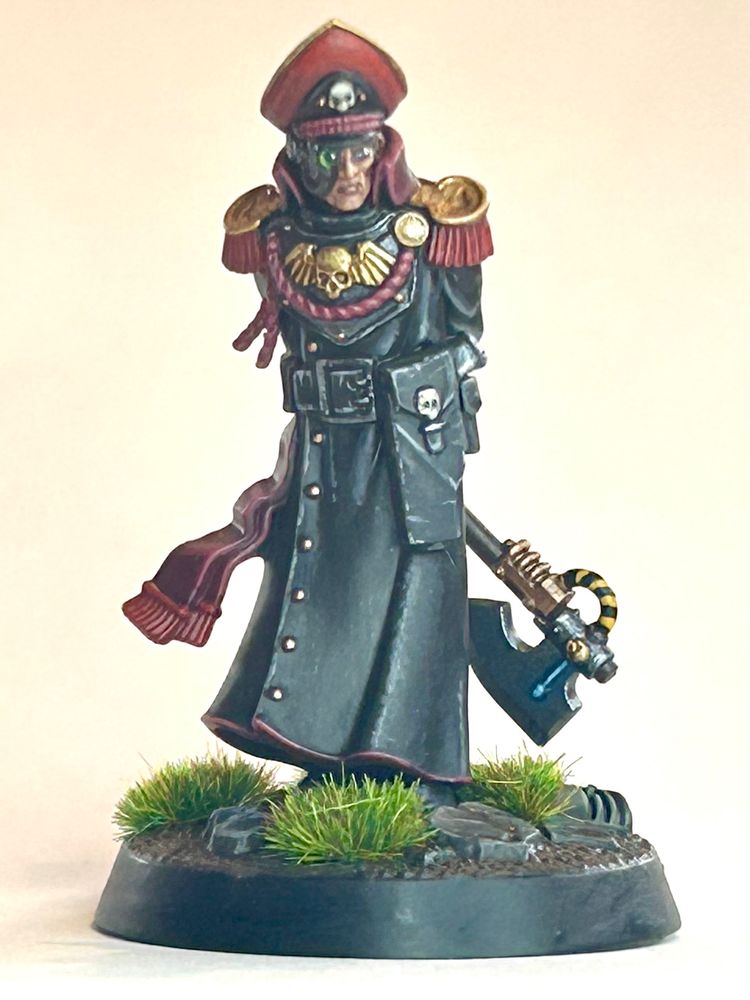 Wh40k Commisssar Shand.
Part of the Hell’s Last box. Bought separate from eBay. Has a red silk flying scarf and swanky epaulets. Got to look good while you’re shooting Ruperts in the back for cowardice.