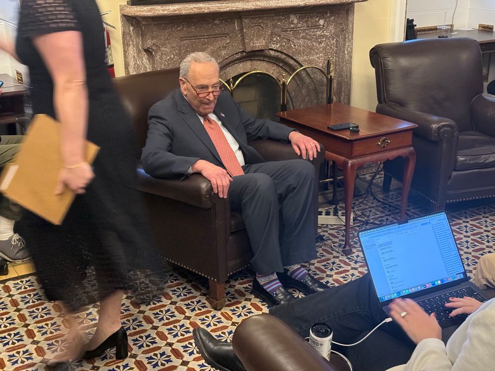 Chuck Schumer looking like he’s stuck in a chair