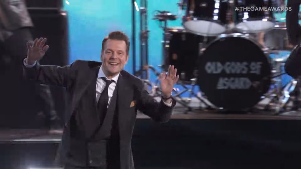 Sam Lake smiling during the live performance at the Game Awards of  Herald Of Darkness 