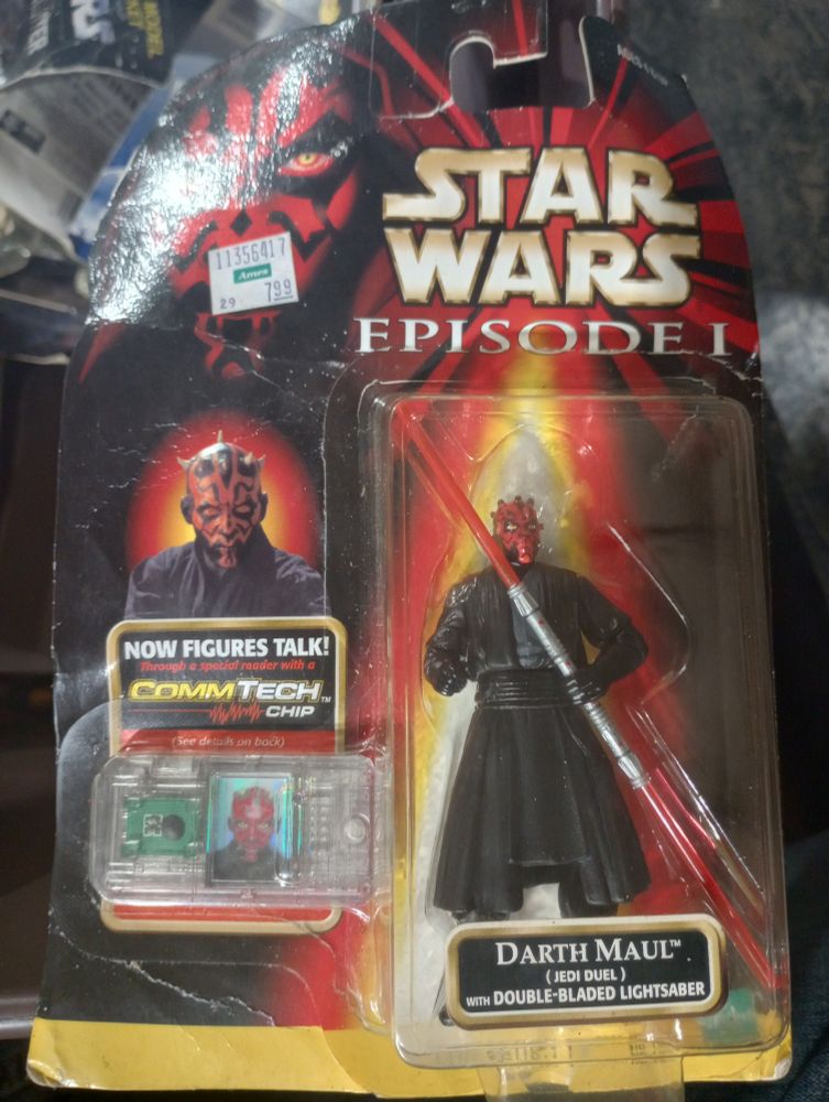 A vintage Star Wars Episode I figure of Darth Maul, showing a price tag of 7.99 at Ames