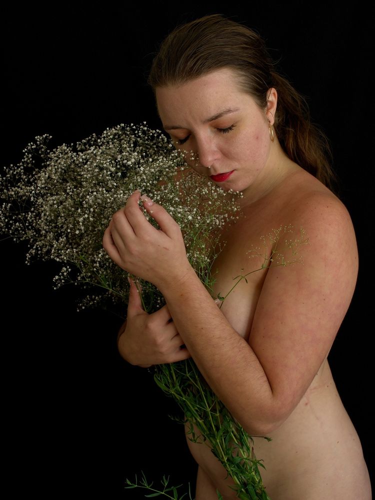 Taylor posing with Baby's Breath.