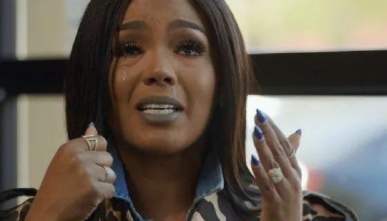 Rashida from Love & Hip Hop: Atlanta crying with tears streaming down her face.

She has both hands up and she's in the middle of talking