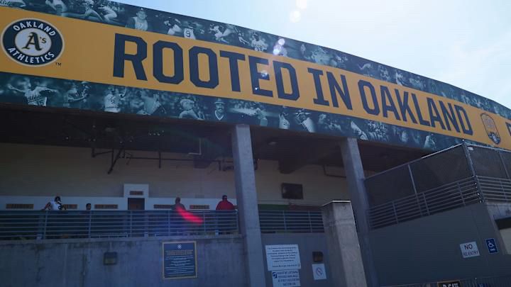 A big “Rooted In Oakland” sign
