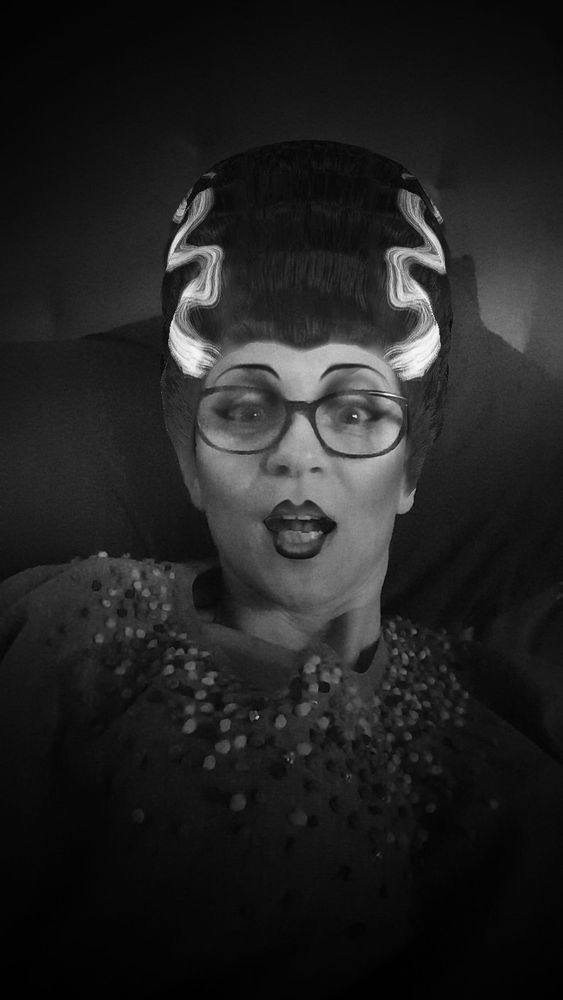 Woman with a bride of Frankenstein filter