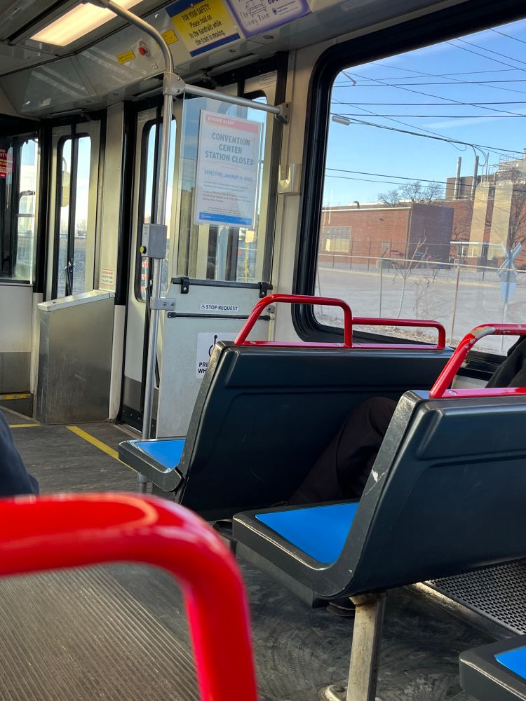 A shitty photo taken across a train car out the window of the approximate site of one of the proposed green Line metro sites at Scott Ave and Ewing Yards. (The photo has been carefully zoomed to avoid capturing other passengers’ faces)