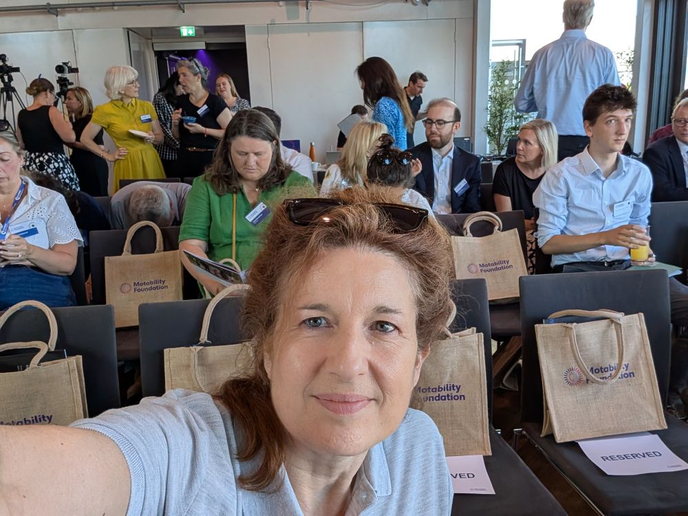 Selfie with other attendees in the room