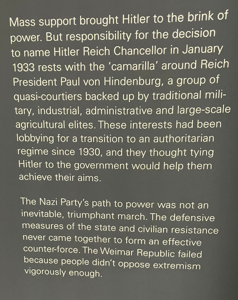 Display board with a last paragraph reading: 'The Nazi Party's path to power was not an inevitable, triumphant march. The defensive measures of the state and civilian resistance never came together to form an effective counter-force. The Weimar Republic failed because people didn't oppose extremism vigorously enough.'