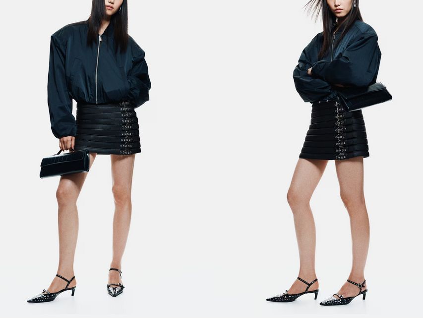 product photo from H&M showing a black pleather miniskirt made completely out of belts
