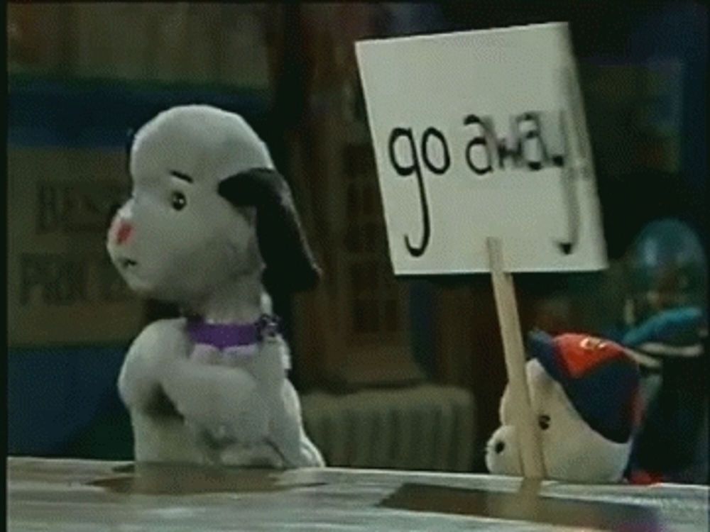 Sweep and Cousin Scamp have a sign saying “go away!”