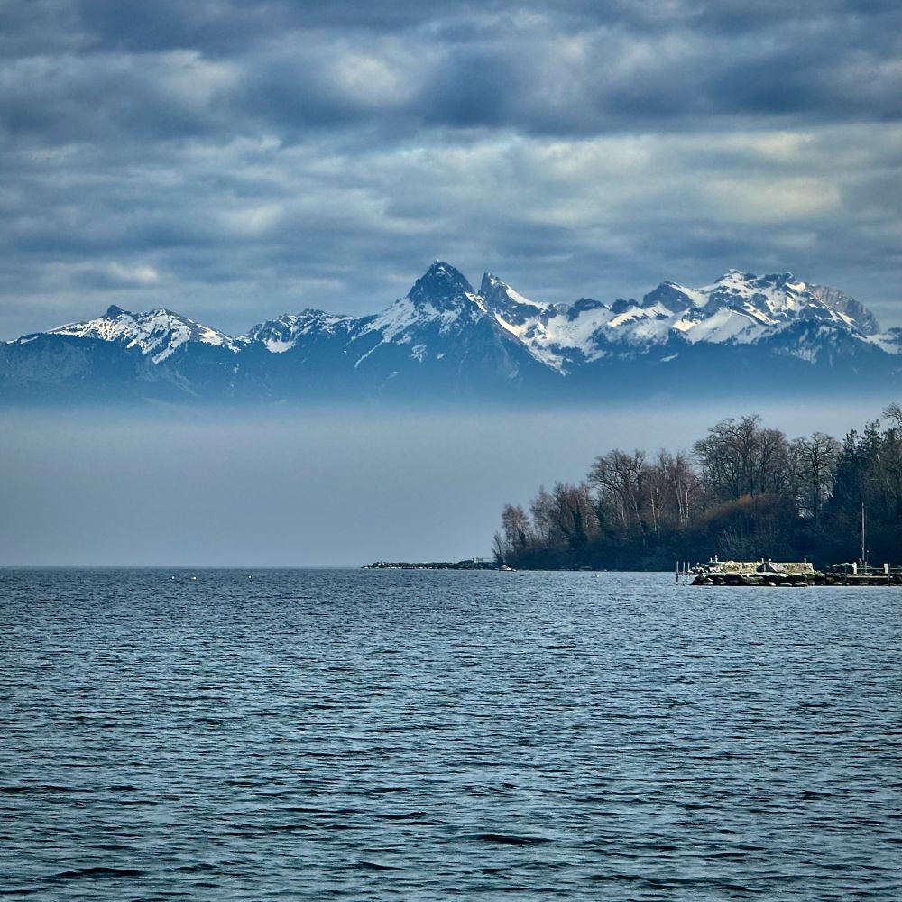 Mont Blanc appearing above the mist over Lac Léman, Yvoire.