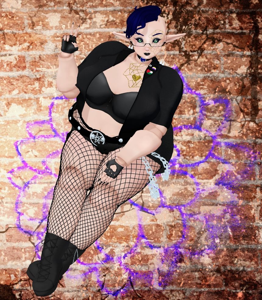 Dahlia sitting with their legs crossed on hand in their lap and the other making a peace sign. They are wearing a fusion of goth and punk aesthetics  and a curly blue mohawk.