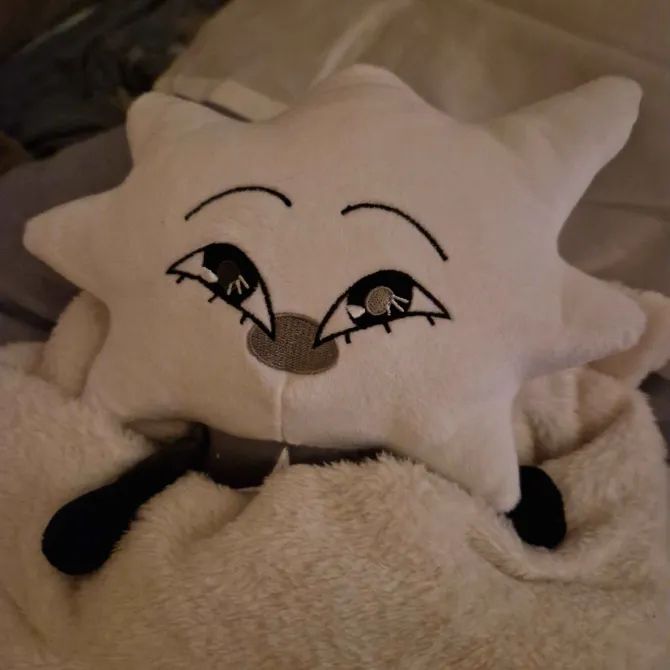 loopy taking a nap in a blankie :] i just realised you can see the blanket my dog scratched through in the background. oops. loop will be kept moderately safe i promise