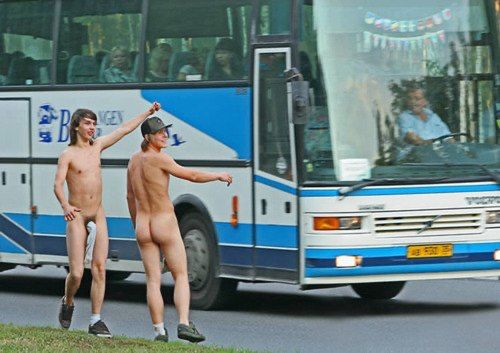 Two good looking your men. They are out in the street, trying to flag down a bus, they are wearing only hats, socks and trainers. We can see one of them has a sock over his dick.