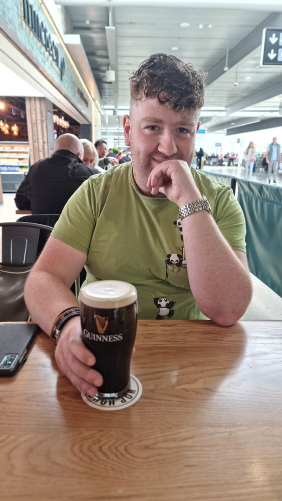 Me nursing a pint of Guinness at Dublin Airport