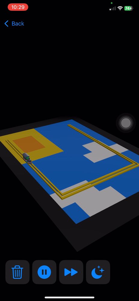 An image of a 3D model train on top of a map made to look like a “blue sky”, using Apples RealityKit framework