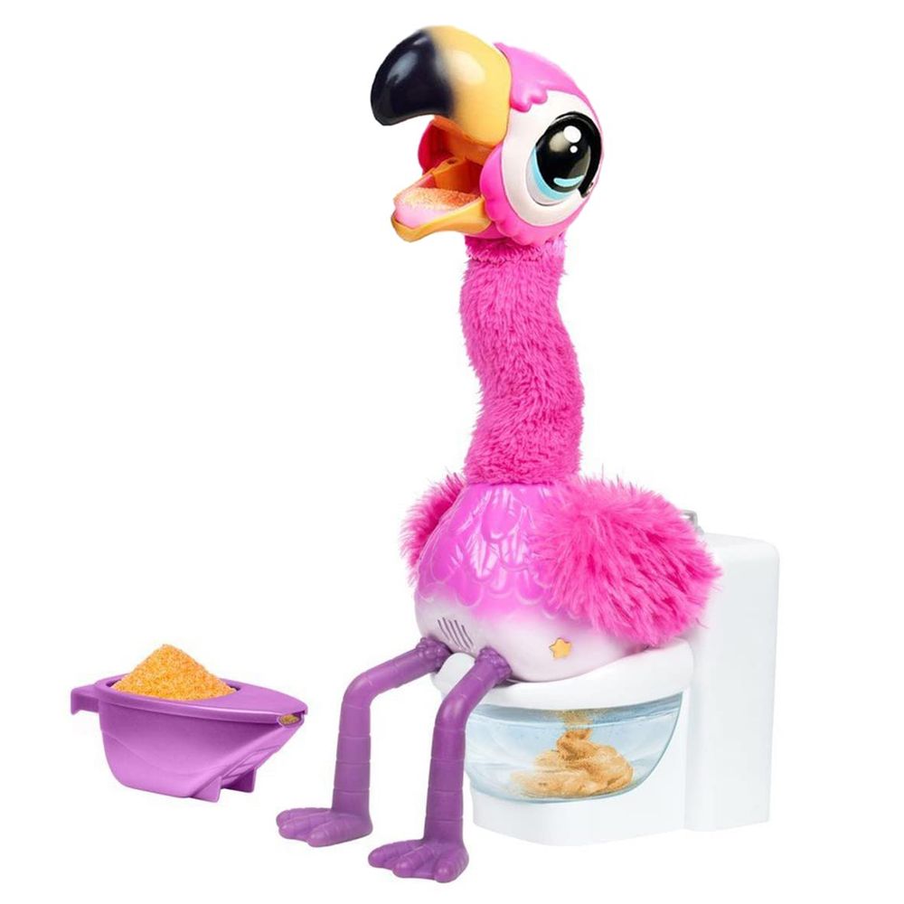 Toy flamingo pooping on a toilet 