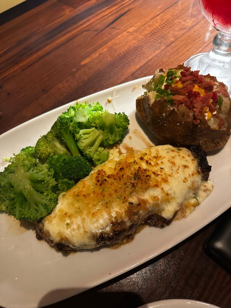steak, brocolli, baked potato 