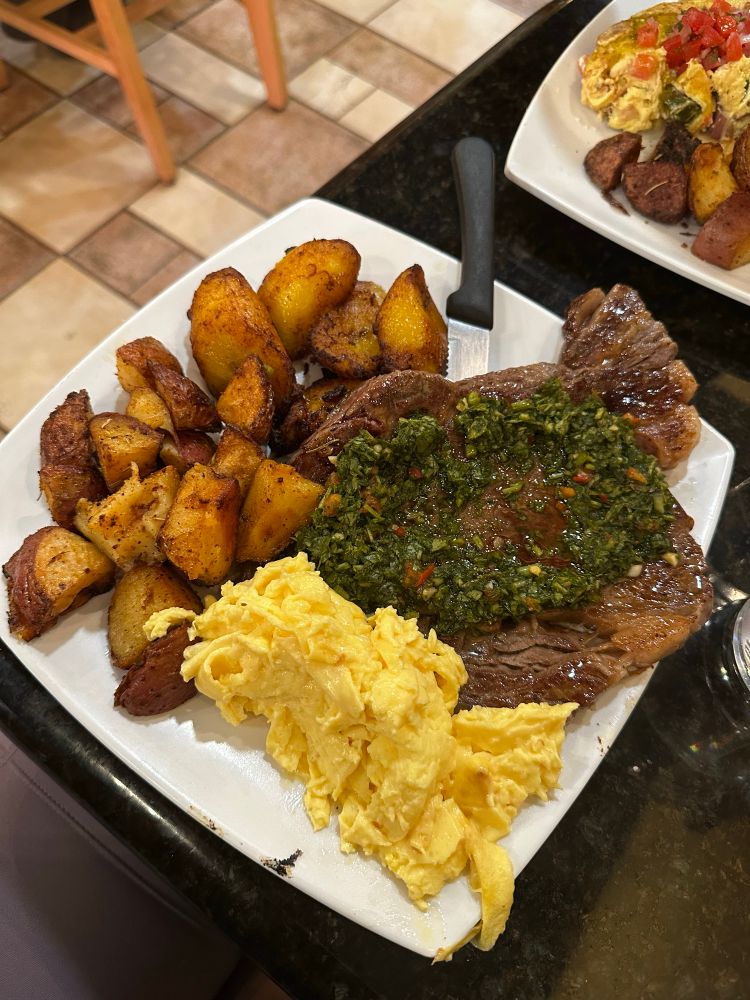 ribeye, eggs, potatoes and plantains 