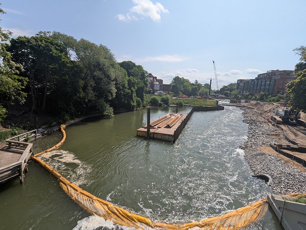 Looking east from Union Street bridge to the FishPass facility on the Boardman Ottaway River in Traverse City, Michigan. Fish sorting channel will be on the left; natural flowing river on the right.