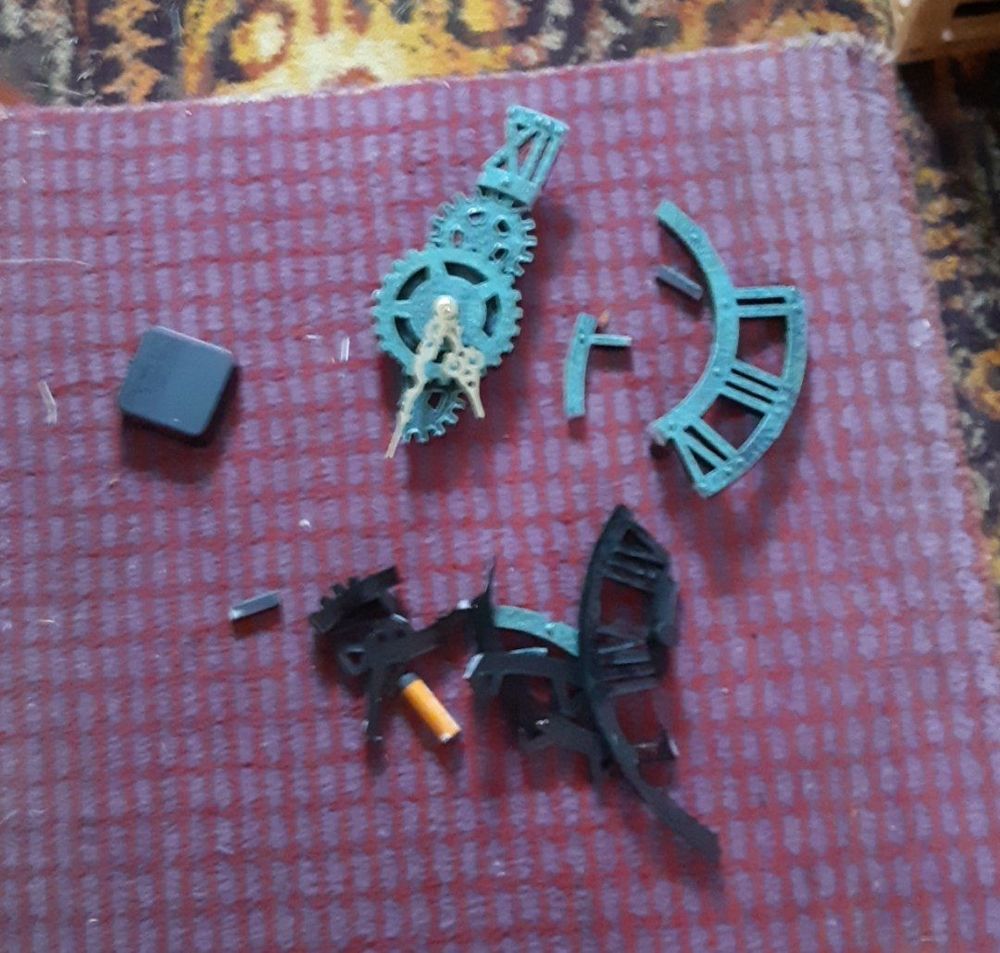 Broken garden clock. Storm damaged.