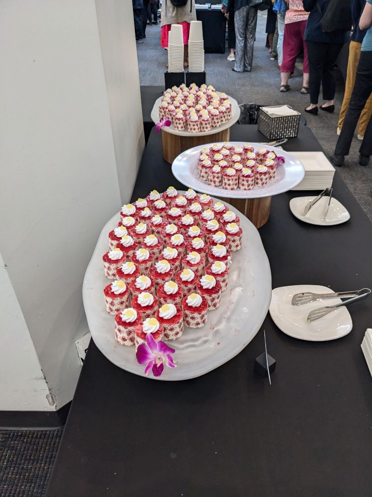Picture of raspberry lemon cake bites, I think. In any case, it's a dessert. It had mousse and a white chocolate shell