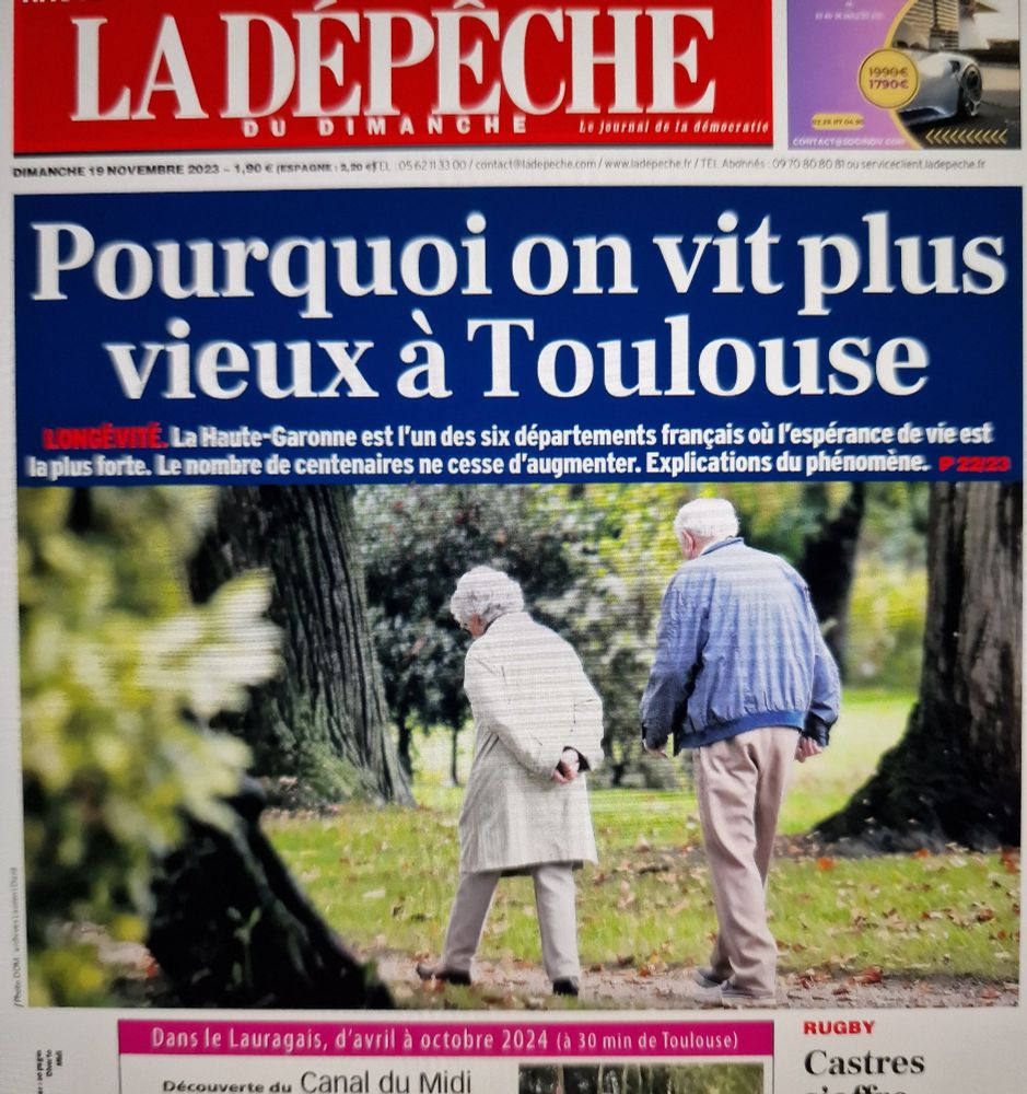 Haut de la première page de la Dépêche du Midi qui titre 
"Pourquoi on vit plus vieux à Toulouse. Longévité : La haute garonne est l'un des six départements français où l'espérance de vie est la plus forte.  Le nombre de centenaires ne cesse d'augmenter. Explications du phénomène. P22/23"
Photo : dans un parc, un couple de personne âgée vu de dos se promène