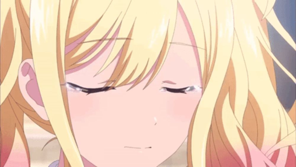 a close up of a blonde anime girl with red eyes crying