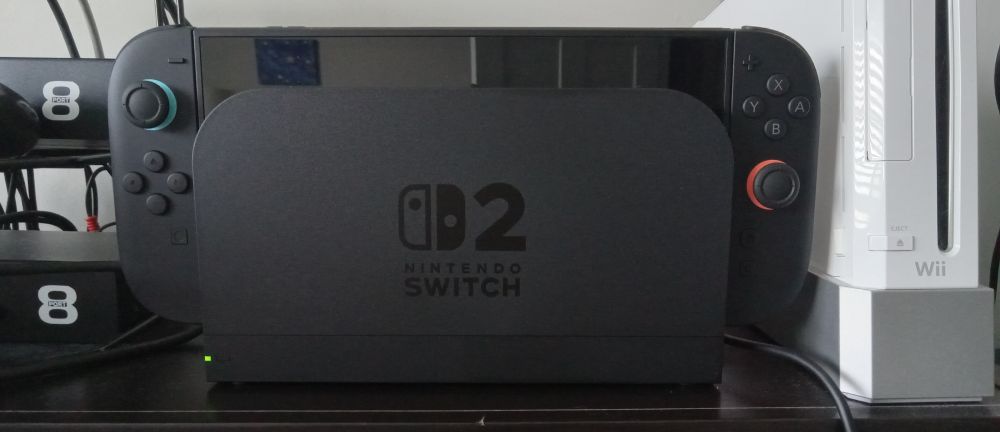 My Nintendo Switch 2, on the left are my video/audio switchers, on the right is my Nintendo Wii