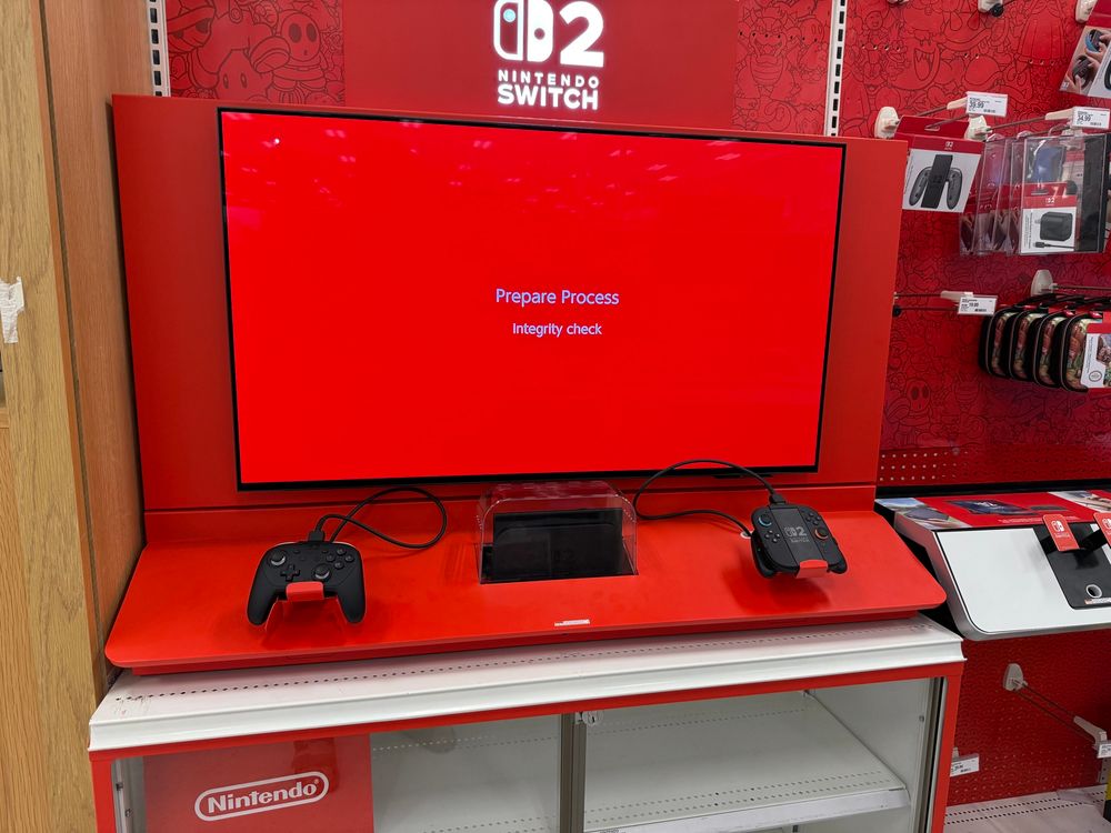 Switch 2 demo kiosk with a red screen and white text that reads “Prepare Process Integrity check”