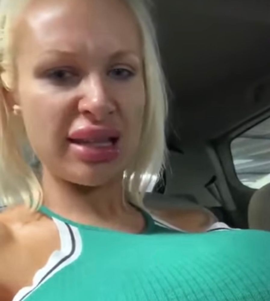 As described above really, this lady was the other half of the double act with her from the previous post, a blonde, pneumatically enhanced genitals enjoyer from the West Country, sat in a car, pulling an face.