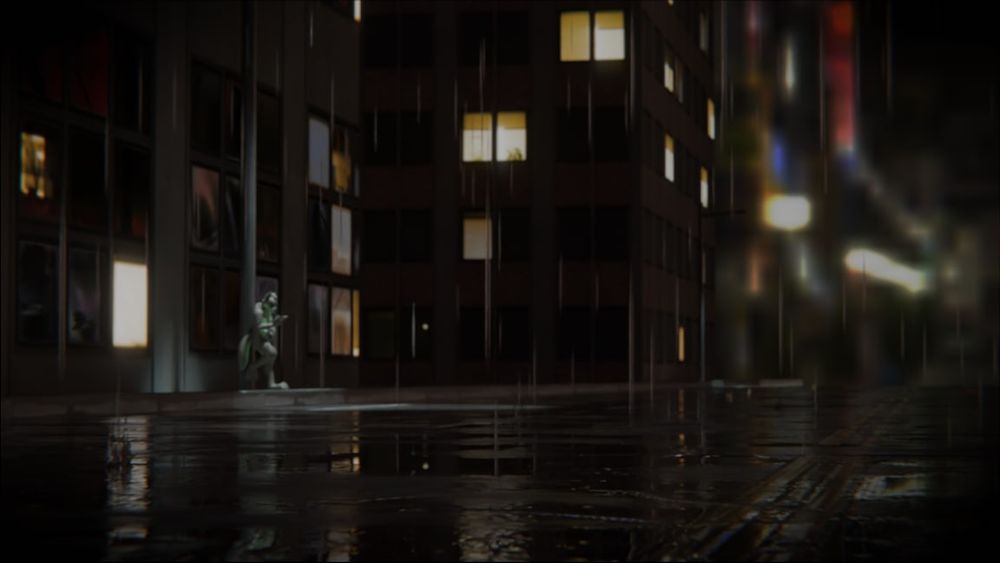 A dark lit street in rain with low perspective next to the wet pavement.  A green and grey coloured character is under a streetlight at distance.