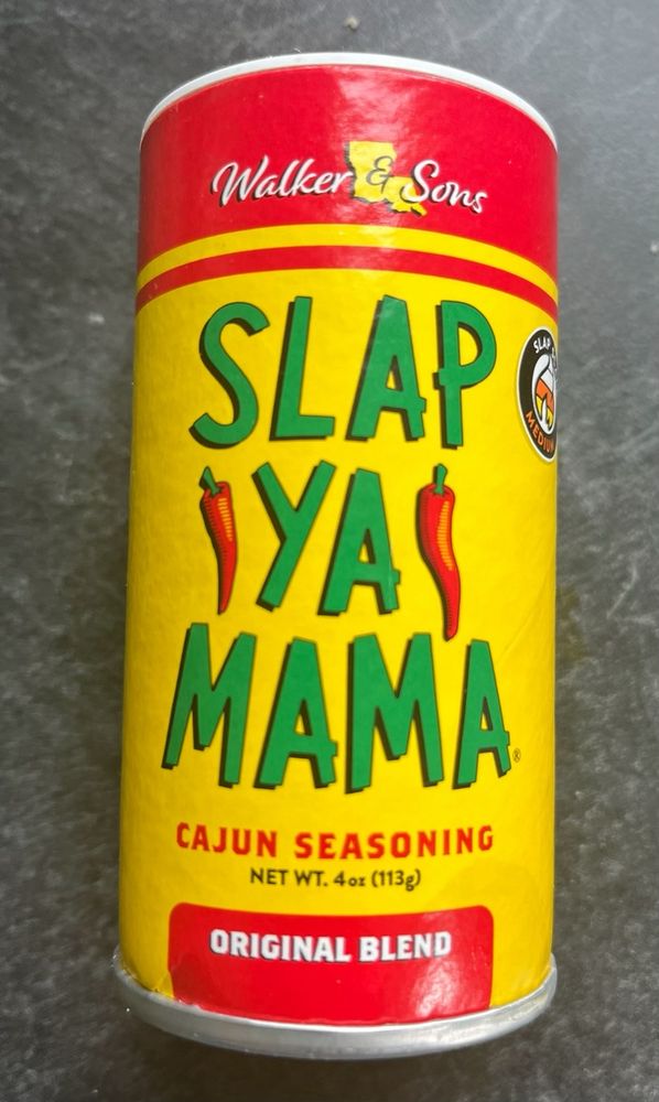 Container of Cajun seasoning called SLAP YA MAMA