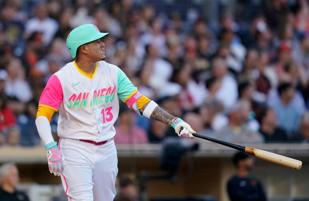Padres batter wearing ugly pink and creamy mint green with yellow trim. Very 80s