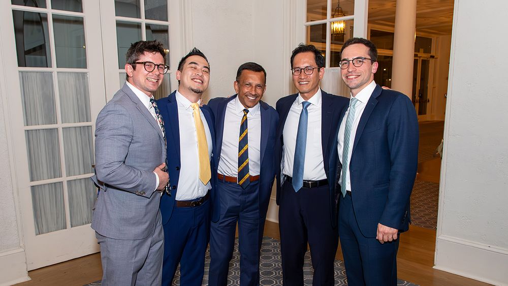 John Andrews, MD, John Yue, MD, neurosurgeon Sandeep Kunwar, MD, neurosurgery department chair Edward Chang, MD, and Tom Wozny, MD smile for a group photo.