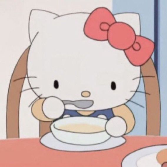Hello Kitty eating some soup