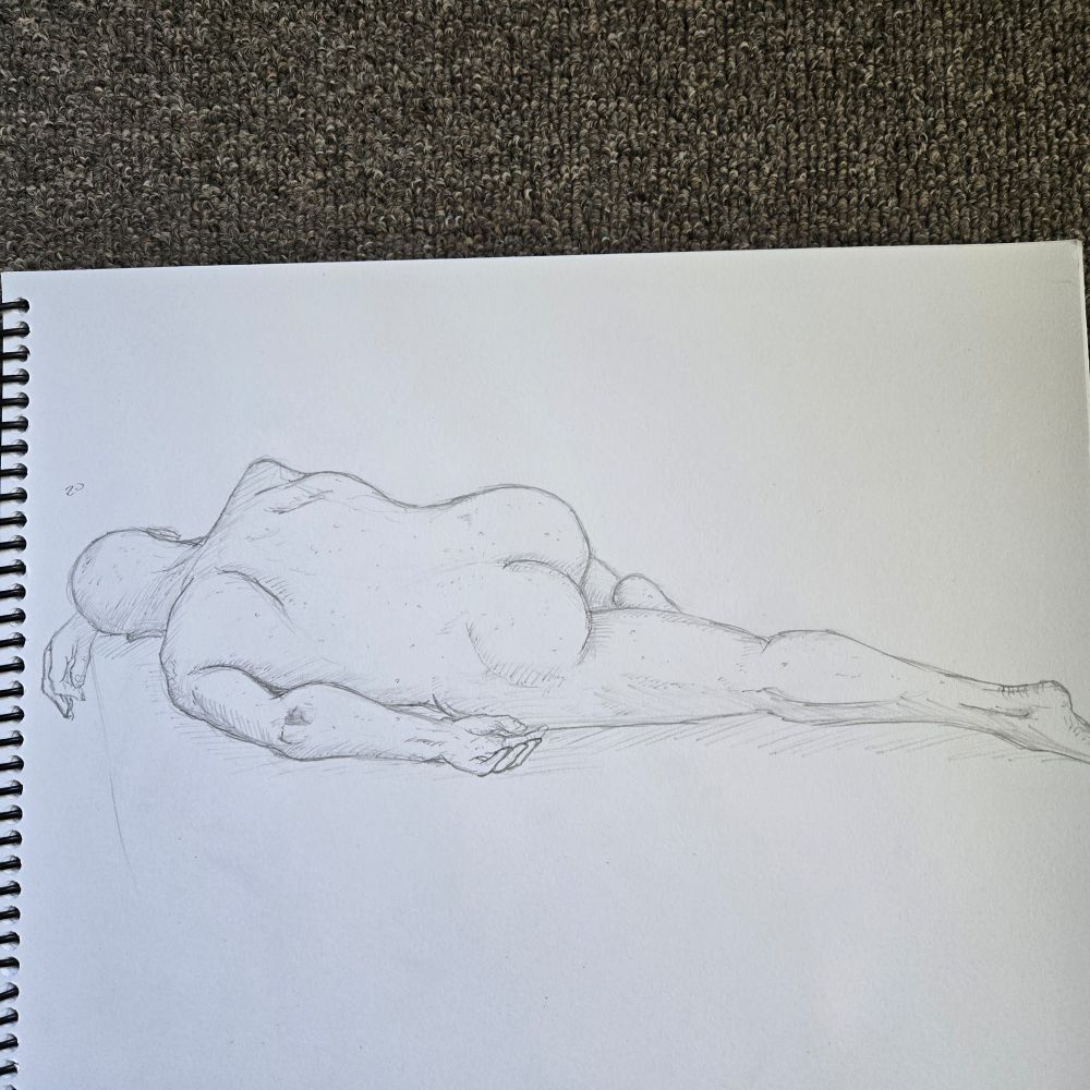 An illustration of a nude man laying with his back to the artist