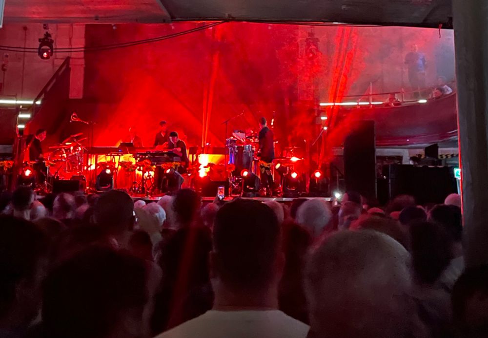 K & D band bathed in red (view from downstairs at the back)