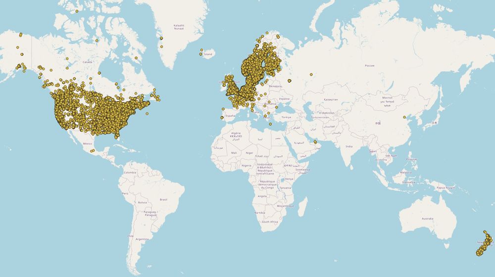 Global map with yellow dots showing distribution of Canada goose.