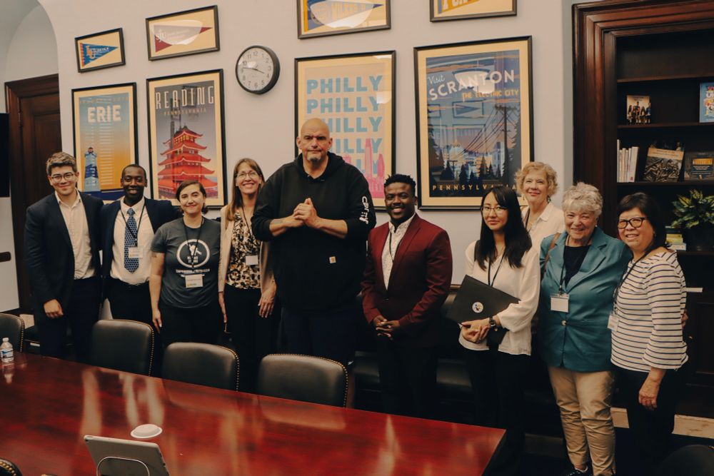 A group picture of Senator Fetterman and several refugee community leaders from across PA.