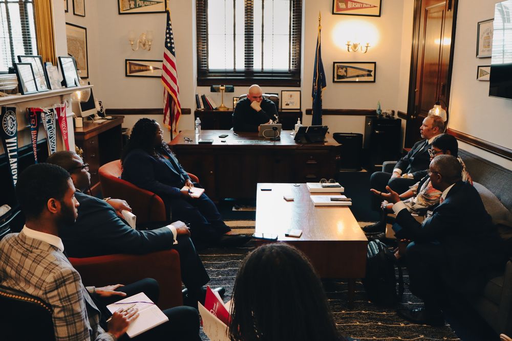 Civil rights leaders speaking with Sen. Fetterman inside his personal office in D.C.