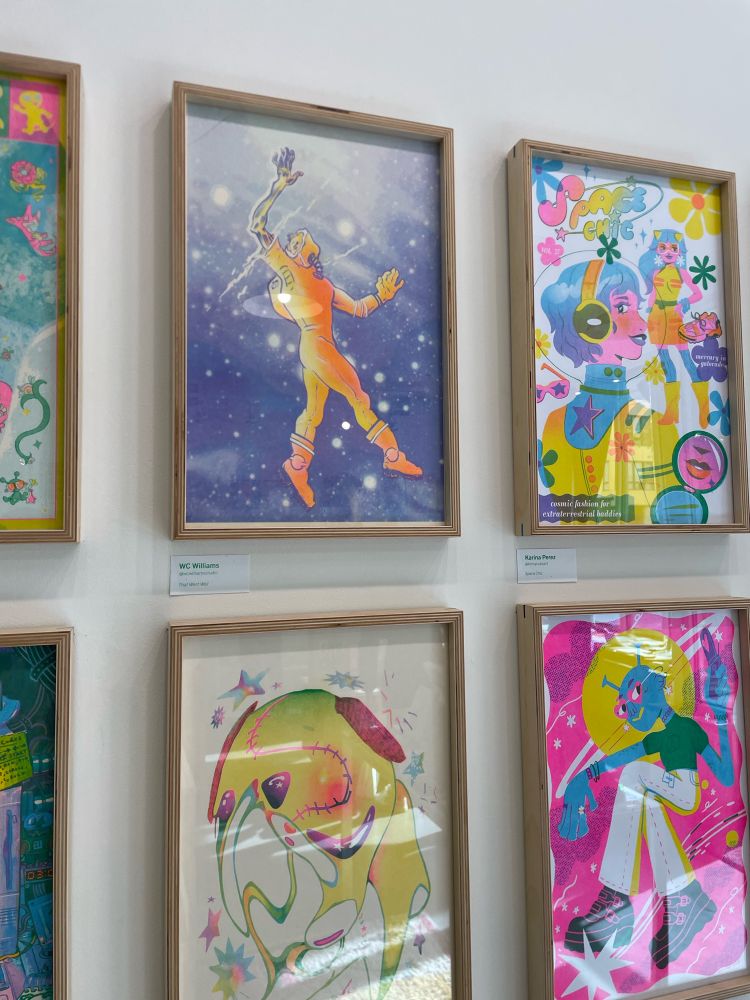 Wood framed brightly colored figurative risograph