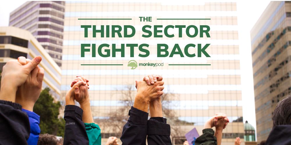 Hands clasped raised in the air with the text "Third Sector Fights Back"