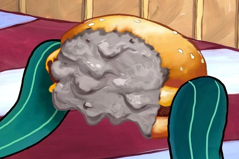 A half-eaten "Krabby Patty" that's really just a pile of grey sludge molded and spray-painted to resemble a typical cheeseburger